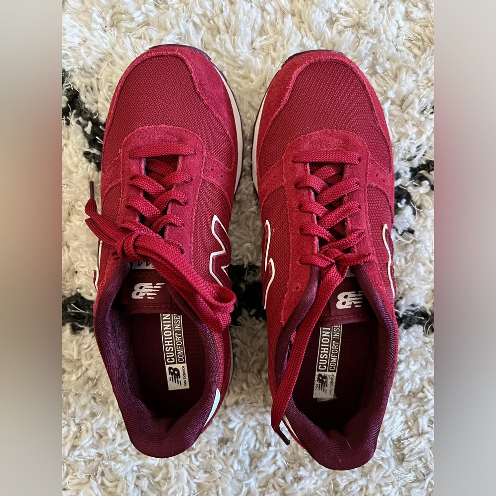 Never worn New Balance 311 with cushion comfort inserts in a deep red color.
